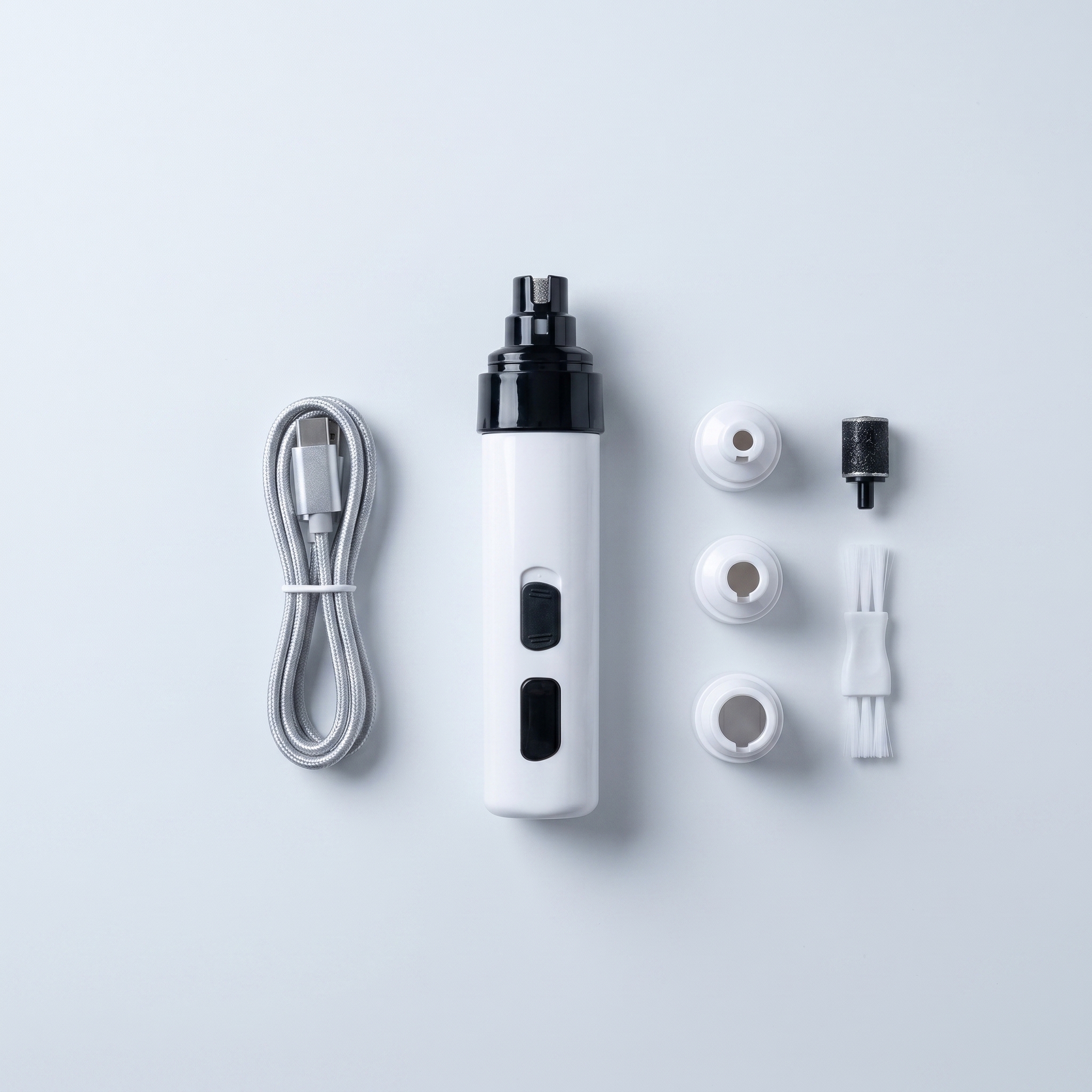 SilentTrim with included accessories — USB-C cable, port caps, cleaning brush